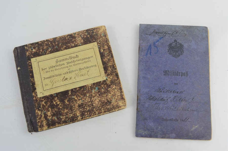 A German WWI soldiers pay book and savings book