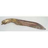 A Middle Eastern carved and decorated bone handled dagger,