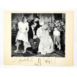 A family photo commemorating the Christening of Prince Edward, signed Elizabeth R and Philip 1964