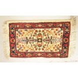 An Indian Indo-Karaota prayer mat, 2ft by 1ft2ins.