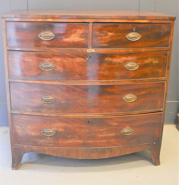 A 19th century mahogany two over three bow fronted chest of drawers, 104cm by 106cm by 53cm