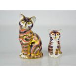 Two Royal Crown Derby cats, LII and LXI 8cm high.