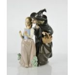 A Lladro porcelain figure group titled Snow White, Witch and the Apple, 5067, 27cm high.