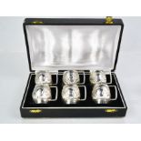 A set of six Sterling silver miniature tankards, each embossed with an elephant and crouching