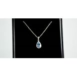 An 18ct white gold, aquamarine and diamond pendant, with 18ct gold chain, 3.9g.