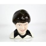 A Lorna Bailey limited edition self portrait bust, 12/100, 11.5cm high.