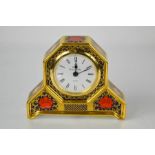 A Royal Crown Derby Old Imari Pattern octagonal clock, 1128 pattern, 11cm high.