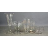 A group of 19th century glassware, each engraved with grape and vine decoration.