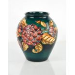 A Moorcroft vase by D J Hancock, signed to the base, no. 5, and dated 1998, 21cm high.