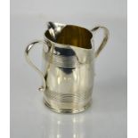 A Victorian silver double lip jug by FB Thomas, London 1895, 7.9toz.