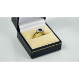 A platinum, blue sapphire and diamond three stone ring, size K½, 4.7g.