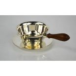 A Tiffany sterling silver mid 20th century sauce / chocolate pot and saucer, the bowl having a