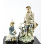 Two Lladro porcelain figurines: boy with lamb and Shepherd seated upon a tree stump 24cm high.