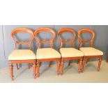 Four Victorian balloon back chairs with cream ground seats, 88cm high