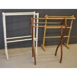 Three towel rails, including one in mahogany and one in pine.