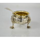 A Victorian silver salt, with gilded interior and embossed with decoration, by William Moulson of