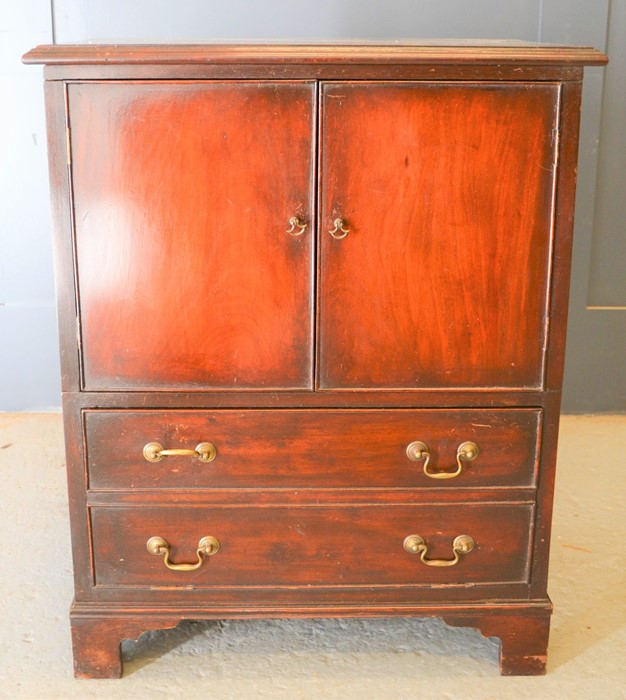 A mahogany tv cabinet, 77cm by 62cm x 38cm