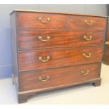 A Georgian Cuban mahogany chest of drawers raised on bracket feet, 106cm by 127cm by 61cm