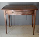 A 19th century mahogany bow fronted side table, tapered legs, 81cm high by 94.5cm