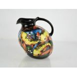 A Moorcroft Jug titled Fishing Around, a limited edition example, No 40/75 produced and designed