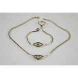 A vintage silver necklace, bracelet and ring set, 0.70toz in total.