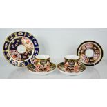 A pair of Royal Crown Derby cups and saucers and dish, together with a Paragon Imari pattern