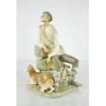 A Lladro porcelain figure group titled Shepherd Resting, number 4571, 26cm high.