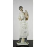 A Lladro porcelain Obstetrician with Newborn Baby, numbered 4763, 36cm high.