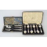 A set of six silver coffee spoons, Birmingham 1926 in original case together with a silver spoon and