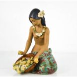 A Lladro porcelain Hawaiian girl with basket of flowers, 26cm high.