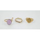 An 18ct gold and amethyst ring set in a platinum mount together with a 9ct gold signet ring and a