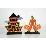 Two limited edition Lorna Bailey flatback pottery ornaments: Manhattan Skyline 131/250 and Bell