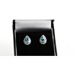 An 18ct white gold, aquamarine and diamond pair of earrings, 2.3g.