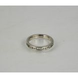 A platinum and diamond ring, size H½, 4.2g.