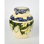 A Moorcroft ginger jar and cover, in the Juneberry pattern, initialled WM and dated 2000, designed