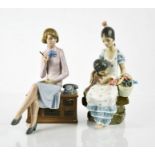 A Nao Lladro figurine; Secretary beside telephone, and Lladro Hawaiian lady with boy and flowers.