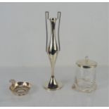 A silver bud vase, silver lidded pot together with a white metal wine taster