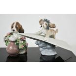 A Lladro porcelain puppy with flowers, and 'Lets Fly Away', numbered 6665, with the original box.