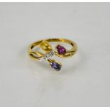 A 9ct gold contemporary amethyst, tanzanite, and yellow citrine ring, size P, 2.5g.