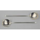 A pair of slim handled sugar spoons by Stokes & Ireland Ltd, Sheffield 1904