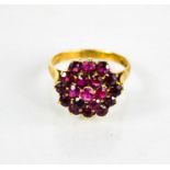 A 9ct gold and pink sapphire cluster ring, size P, 3.74toz.