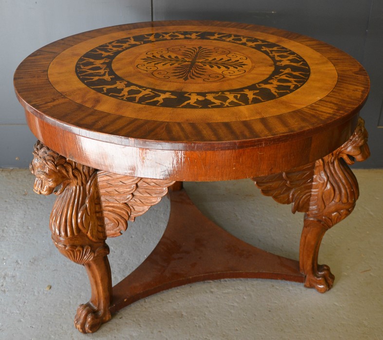 An Art Deco period fiddleback mahogany and marquetry circular centre table, the top with radiating