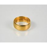 A 9ct gold wedding band, size S/T, 6.90g.