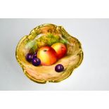 A Royal Worcester dish painted with still life of fruit, by George Moseley, date code 1936, 11.5cm