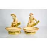 A pair of Royal Worcester comports, each modelled as a boy and girl on a tree stump, date code 1886,