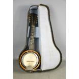 A vintage eight string banjo / mandolin and original case.