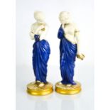 A pair of Royal Worcester figures, Joy and Sorrow, modelled in blue and gilt robes, circa 1925, 26cm