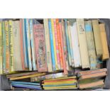 A quantity of children's books and annuals to include Rupert annual, Alice's Adventures in