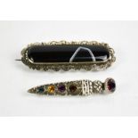 A Victorian agate and silver mounted brooch, together with a Scottish dirk brooch.