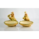 A pair of Royal Worcester comports, modelled as boy and girl, circa 1890, 16cm high.